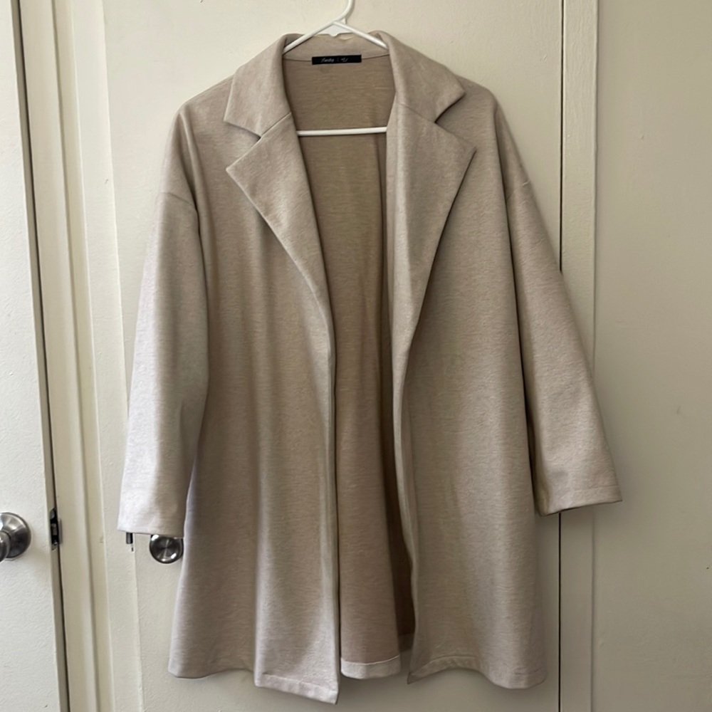 Beige jacket; size L